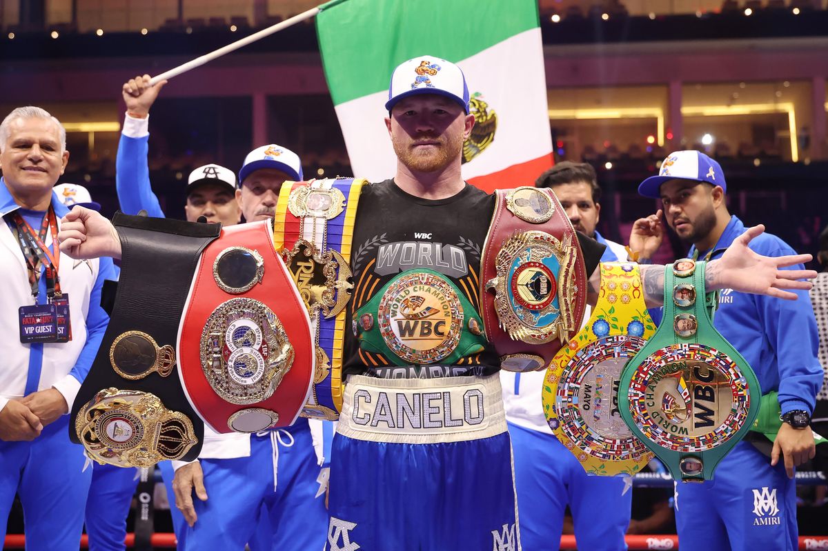 Saul "Canelo" Alvarez poses for a photo with his belts after beating William Scull to win the Super- Middleweight World Championship on the Fatal Fury City of Wolves card at ANB Arena on May 03, 2025 in Riyadh, Saudi Arabia. (Photo by Richard Pelham/Getty Images)