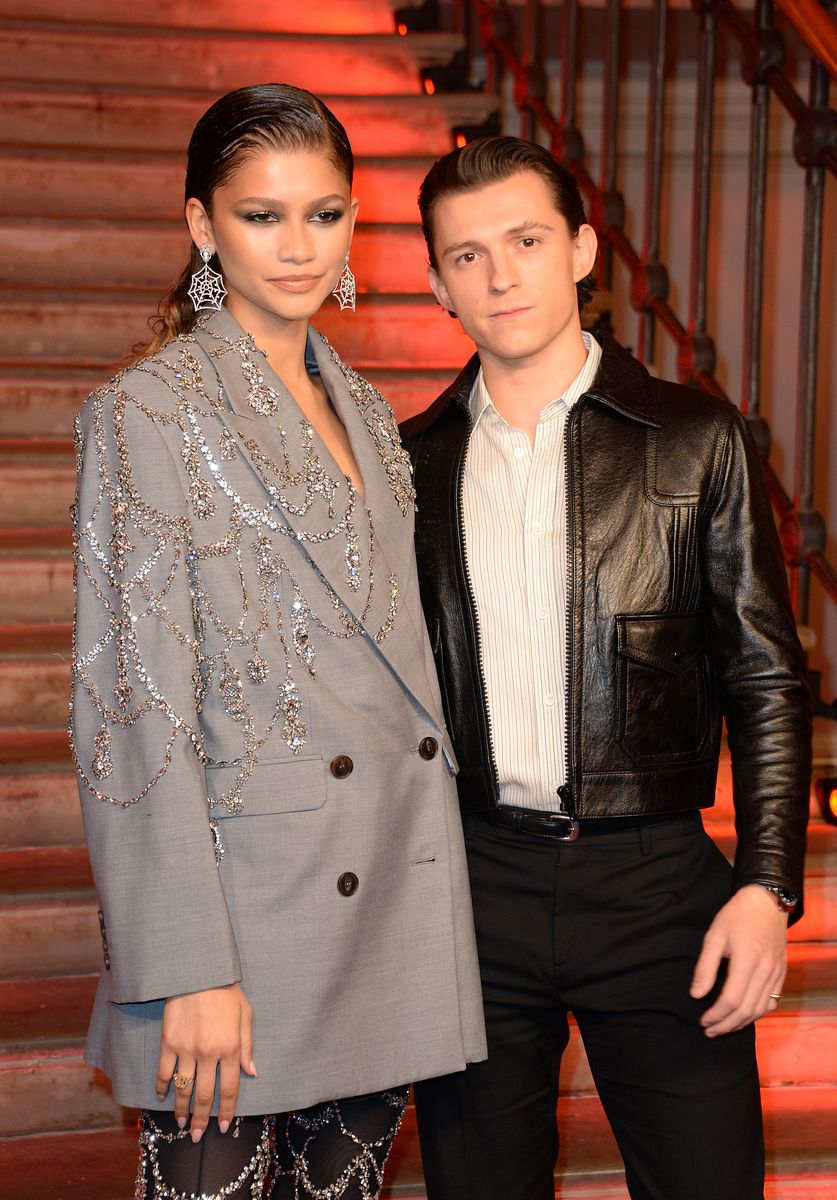 Zendaya and Tom Holland pose at a photocall for "Spider-Man: No Way Home" at The Old Sessions House on December 5, 2021 in London, England.