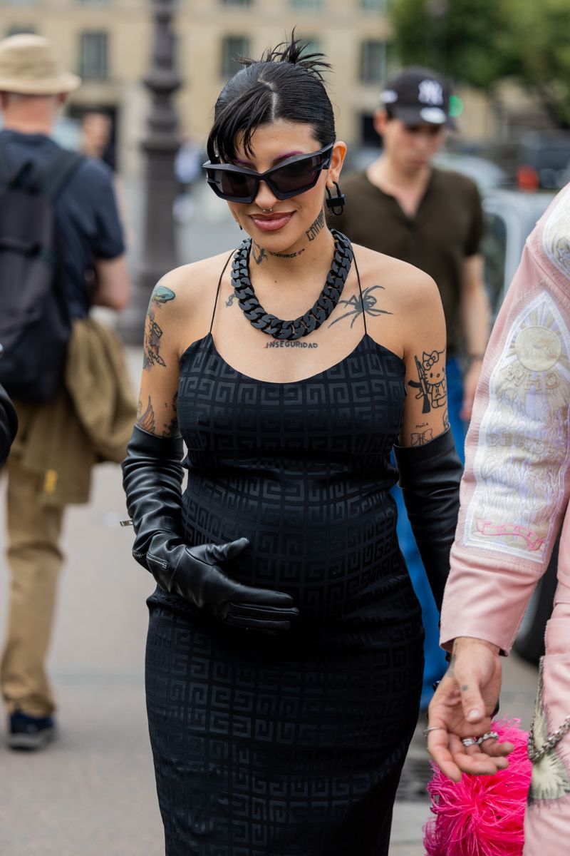 PARIS, FRANCE - JUNE 22: Cazzu wears black dress outside Givenchy during the Menswear Spring/Summer 2024 as part of  Paris Fashion Week on June 22, 2023 in Paris, France. (Photo by Christian Vierig/Getty Images) 