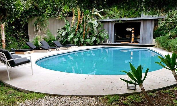 A chic and cozy backyard with pool.