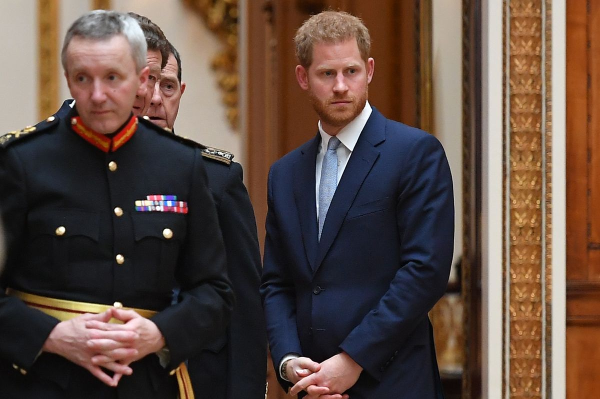Britain's Prince Harry, Duke of Sussex looks on as US President Donald Trump