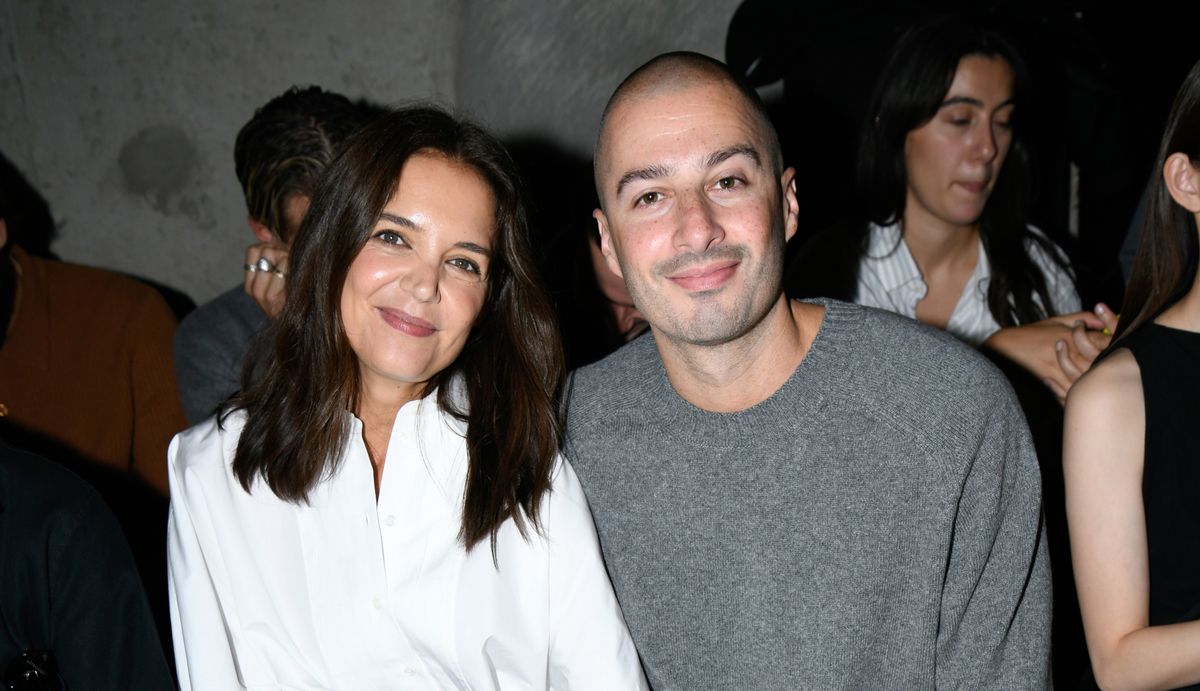 Katie and Jason at Paris Fashion Week earlier this month