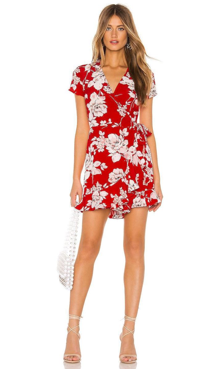 Red wrap dress with white rose print by Yumi Kim