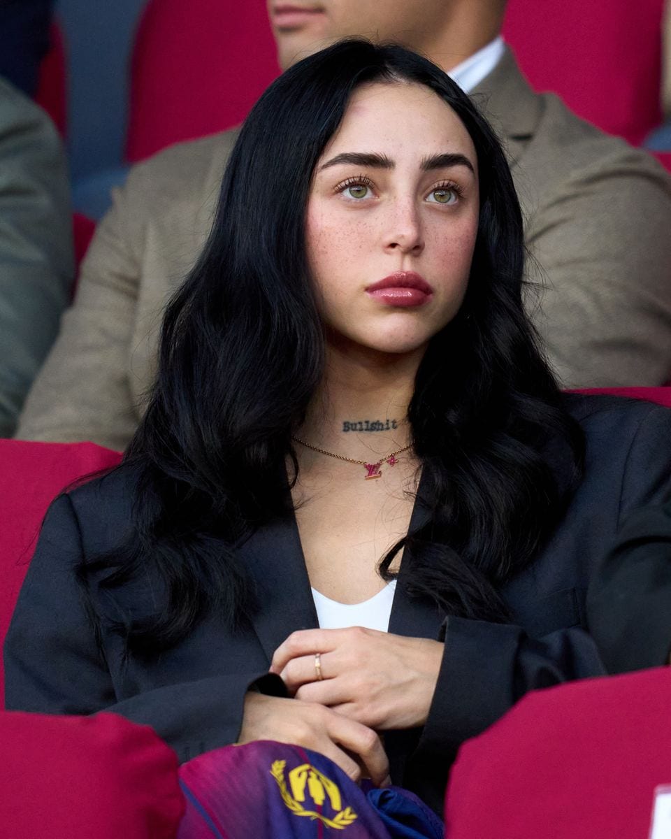 BARCELONA, SPAIN - OCTOBER 21: Nicki Nicole, rapper and singer-songwriter and partner of Lamine Yamal of FC Barcelona is seen in the stands prior to the UEFA Champions League 2025/26 League Phase MD3 match between FC Barcelona and Olympiacos FC at Estadi Olimpic Lluis Companys on October 21, 2025 in Barcelona, Spain. (Photo by Alex Caparros/Getty Images)