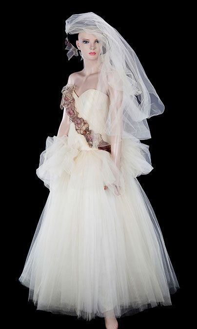 Madonna's stunning dress is among 140 items from her life and career that will be going under the hammer