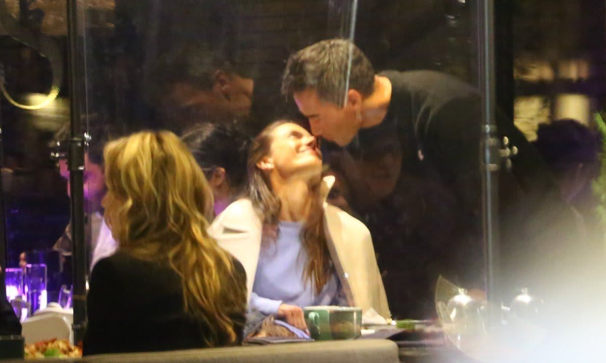 Alessandra Ambrosio enjoys a kiss with Richard Lee during dinner date