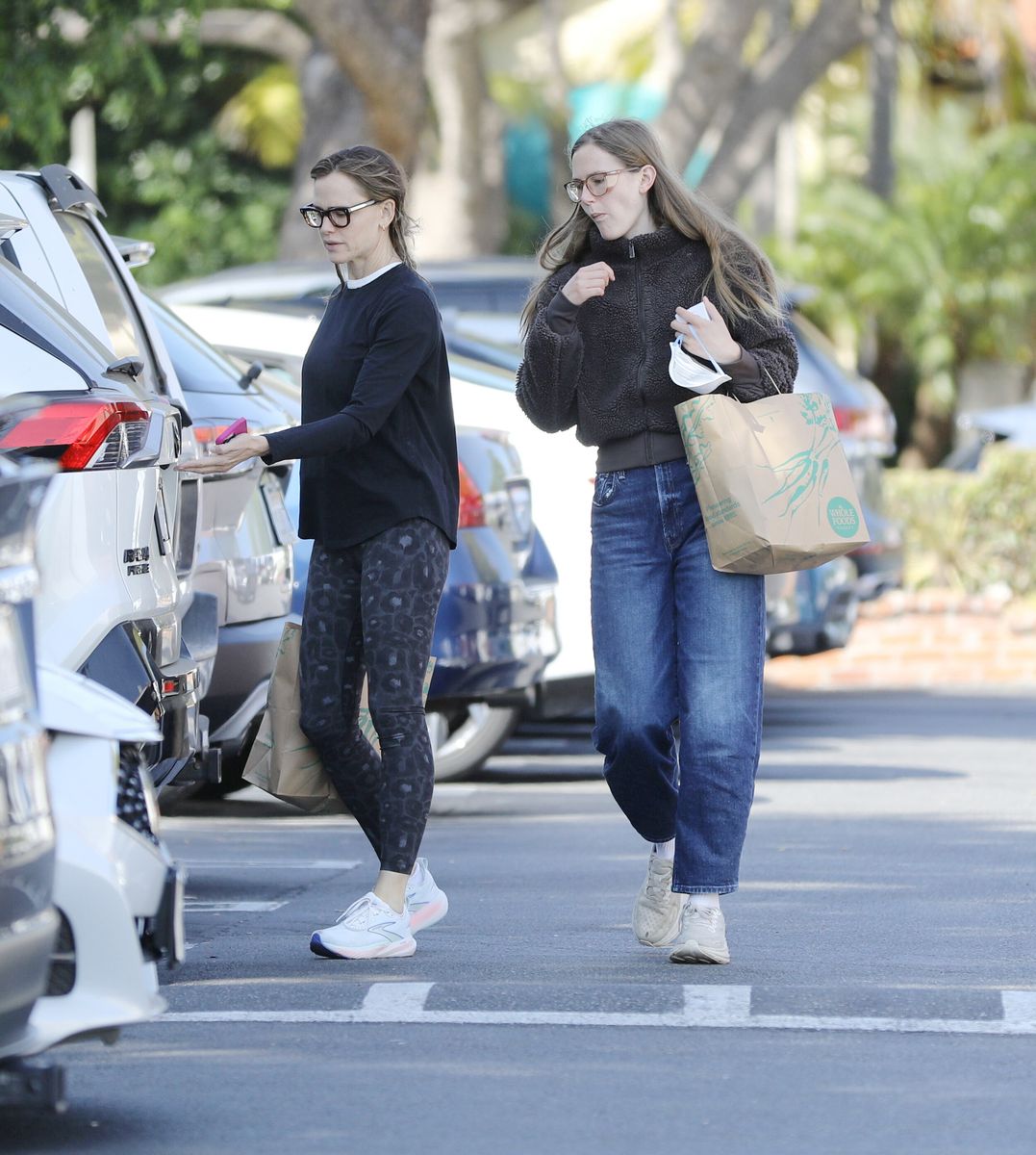 Jennifer and Violet purchasing some groceries together