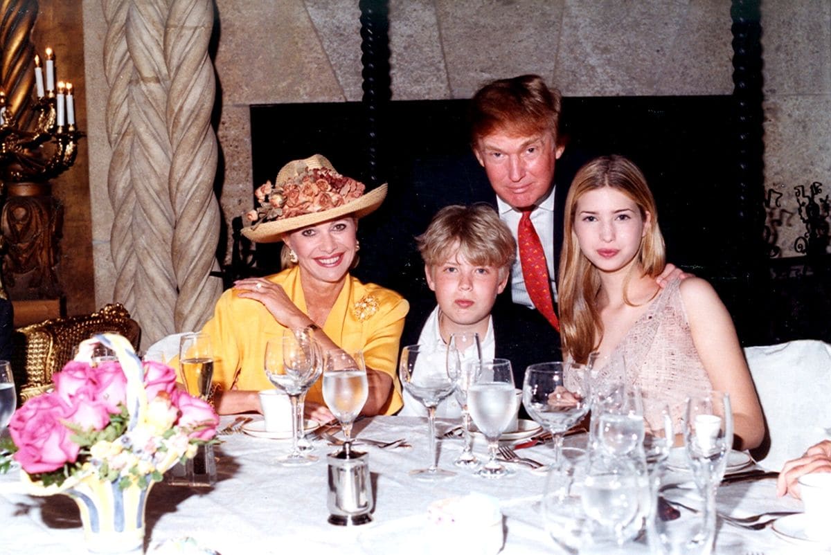 Ivana Trump, Eric Trump, Donald Trump, and Ivanka Trump at a table at the Mar-a-Lago estate, Palm Beach, Florida, 1998. 