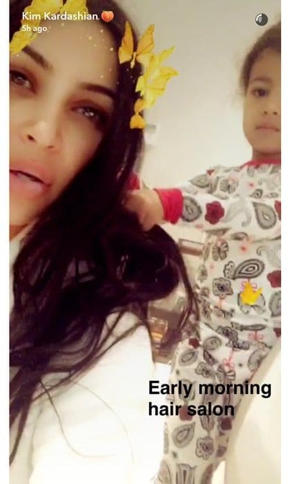 North played with her mom's hair in videos documented on Kim's Snapchat.
Photo: Snapchat/KimKardashianWest