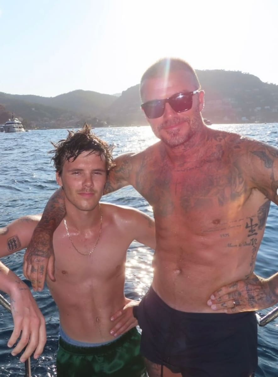 David and Cruz Beckham cool off after a swim in the Mediterranean.