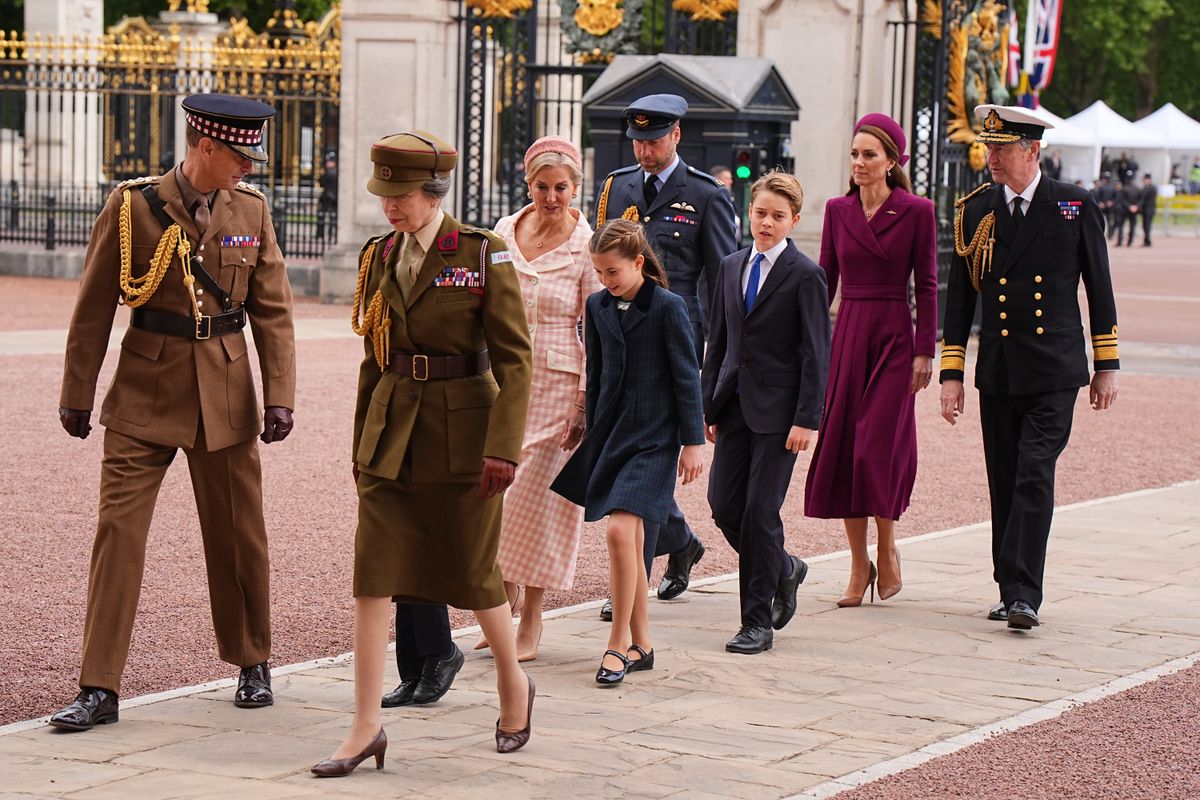 LONDON, ENGLAND - MAY 5: (from front) Prince Edward, Duke of Edinburgh, Princess Anne, Princess Royal, Prince Louis, Sophie, Duchess of Edinburgh, Princess Charlotte, Prince George, Prince William, Prince of Wales, Catherine, Princess of Wales and Vice Admiral Sir Tim Laurence return to Buckingham Palace following the military procession for the 80th anniversary of VE Day, in honour of those who served during the Second World War, at Buckingham Palace on May 5, 2025 in London, England. Around 1300 members of the armed forces, including the Royal Navy, the Royal Marines, the British Army and the Royal Air Force, along with Commonwealth nations, Ukraine, and Nato allies are taking part in the military procession for Victory in Europe Day, which is celebrated each year on May 8, marking the day the Allies formally accepted Germany's surrender in 1945. (Photo by Aaron Chown - WPA Pool/Getty Images)