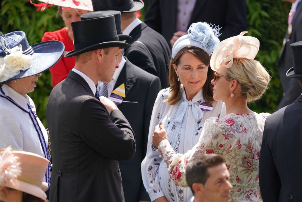 The Prince of Wales speaks to Carole Middleton and Zara Phillips during day two of Royal Ascot 2024