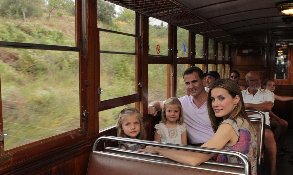 The royals looked like any other family enjoying a train excursion during their visit to Majorca in 2012.