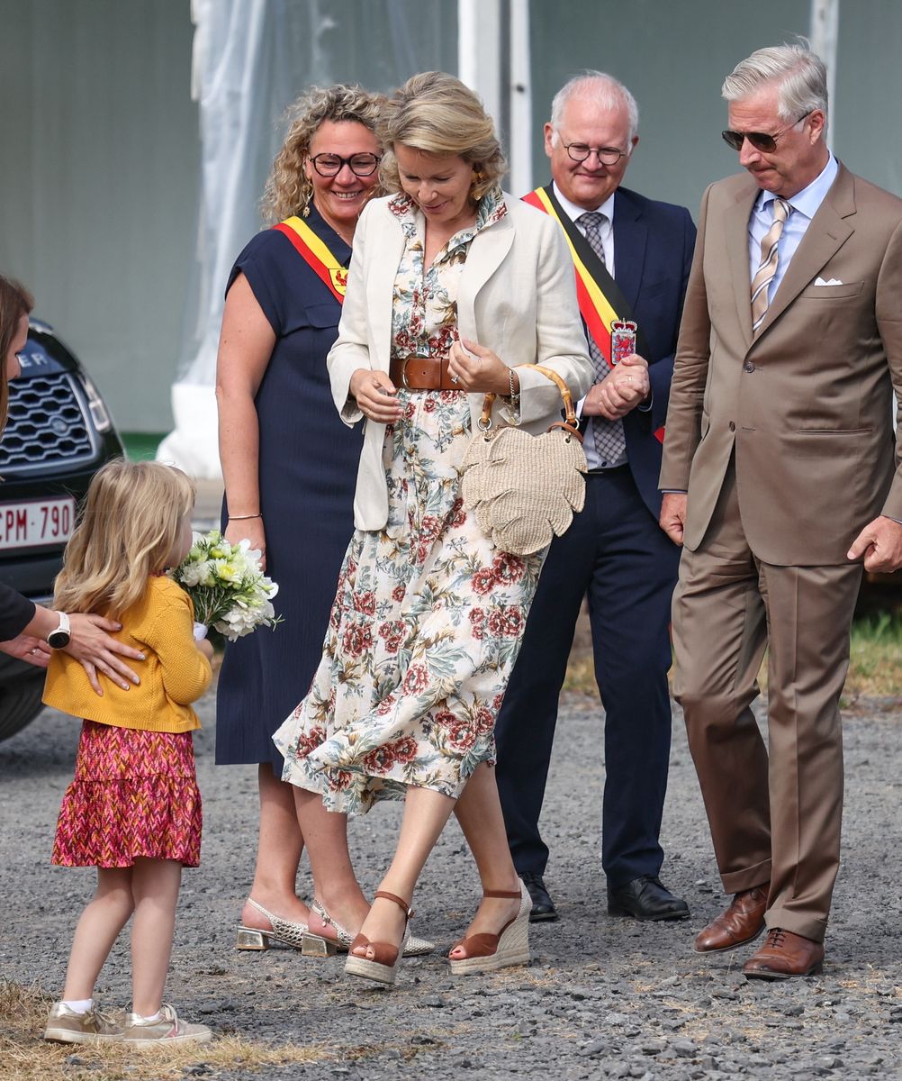 Queen Mathilde proved floral dresses remain a royal favorite while visiting Europe's largest open-air agricultural fair.