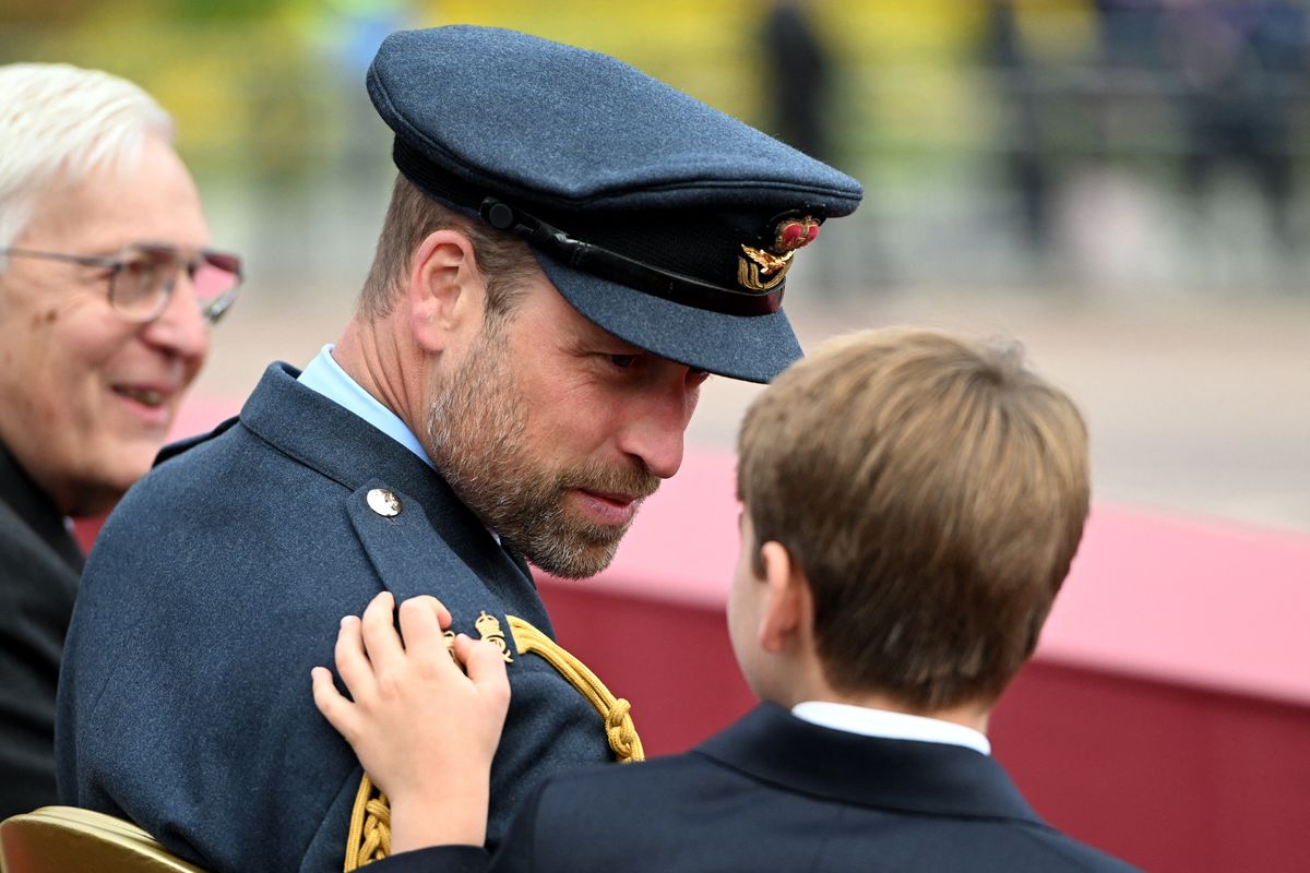 Britain's Prince William, Prince of Wales talks to Britain's Prince Louis of Wales before a parade in central London on May 5, 2025 to celebrate the 80th anniversary of VE Day also known as Victory in Europe Day, marking the end of the Second World War in Europe. (Photo by Eddie MULHOLLAND / POOL / AFP) (Photo by EDDIE MULHOLLAND/POOL/AFP via Getty Images)          
