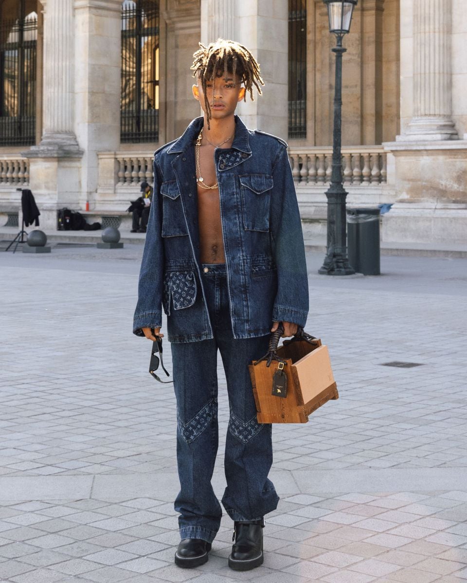  The oversized denim jacket had practical pockets and detailed LV monogram accents peeking from the flaps, giving it subtle texture and depth.