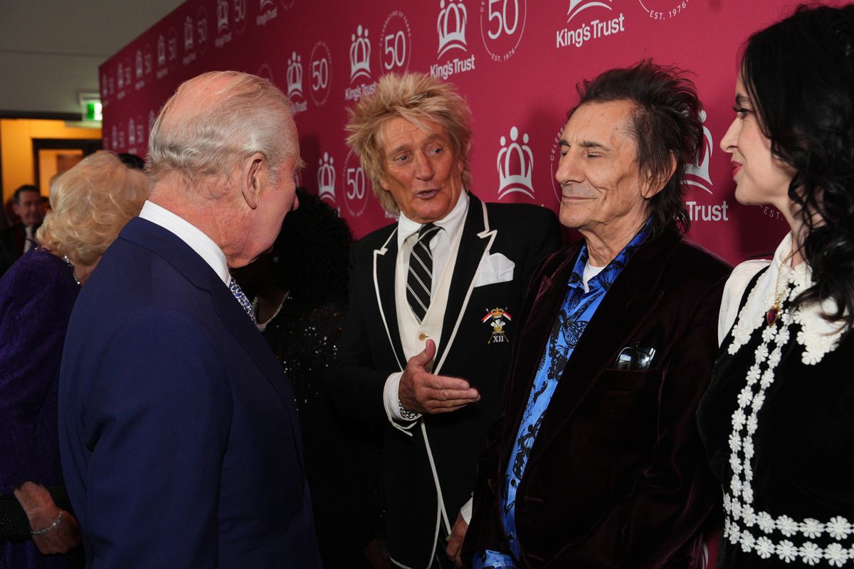 King Charles III meets Sir Rod Stewart and Ronnie Wood.
