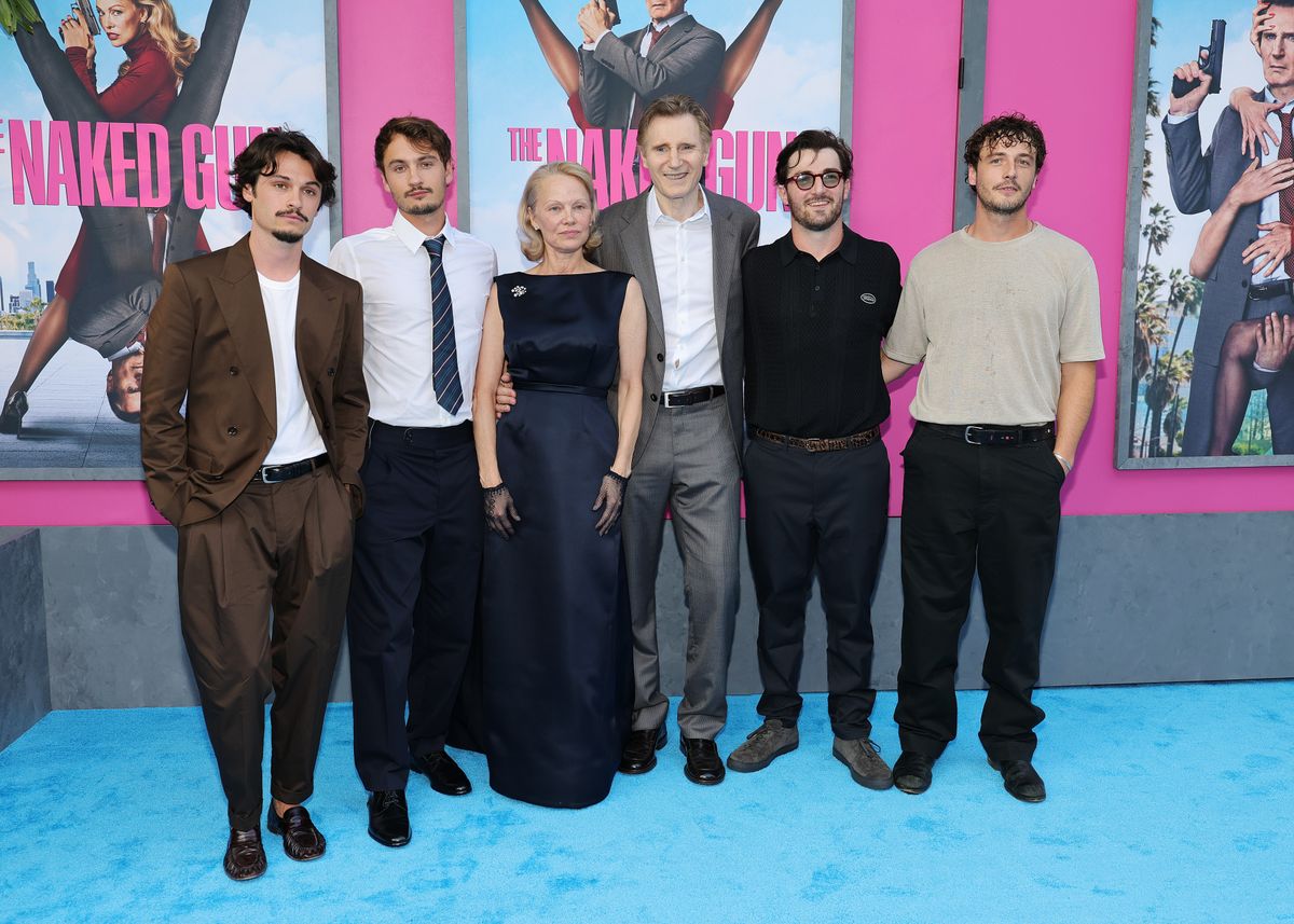 Anderson and Neeson alongside their respective children: Dylan Jagger and Brandon Thomas Lee, and Daniel and Michael Neeson