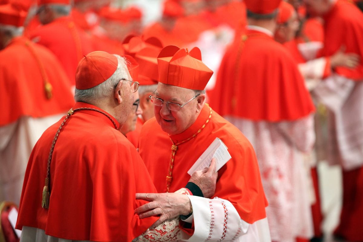 Archbishop of Dallas Kevin Joseph Farrell receives congratulations from cardinals during the Ordinary Public Consistory celebrated by Pope Francis at St. Peter's Basilica on November 19, 2016 in Vatican City, Vatican. Thirteen of the new Cardinals will be under 80 years and will be eligible to vote in a conclave.  