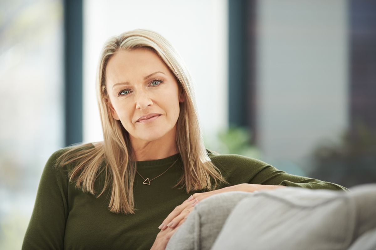 Portrait of a mature woman relaxing on the sofa at home