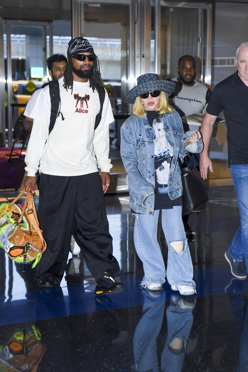 Madonna rocks $1,050 Britney Spears Balenciaga tee in stylish JFK airport look