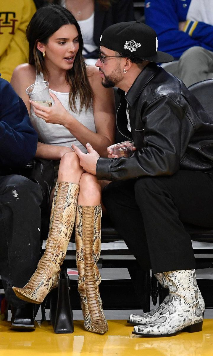 Bad Bunny and Kendall Jenner coordinate shoes at Lakers game