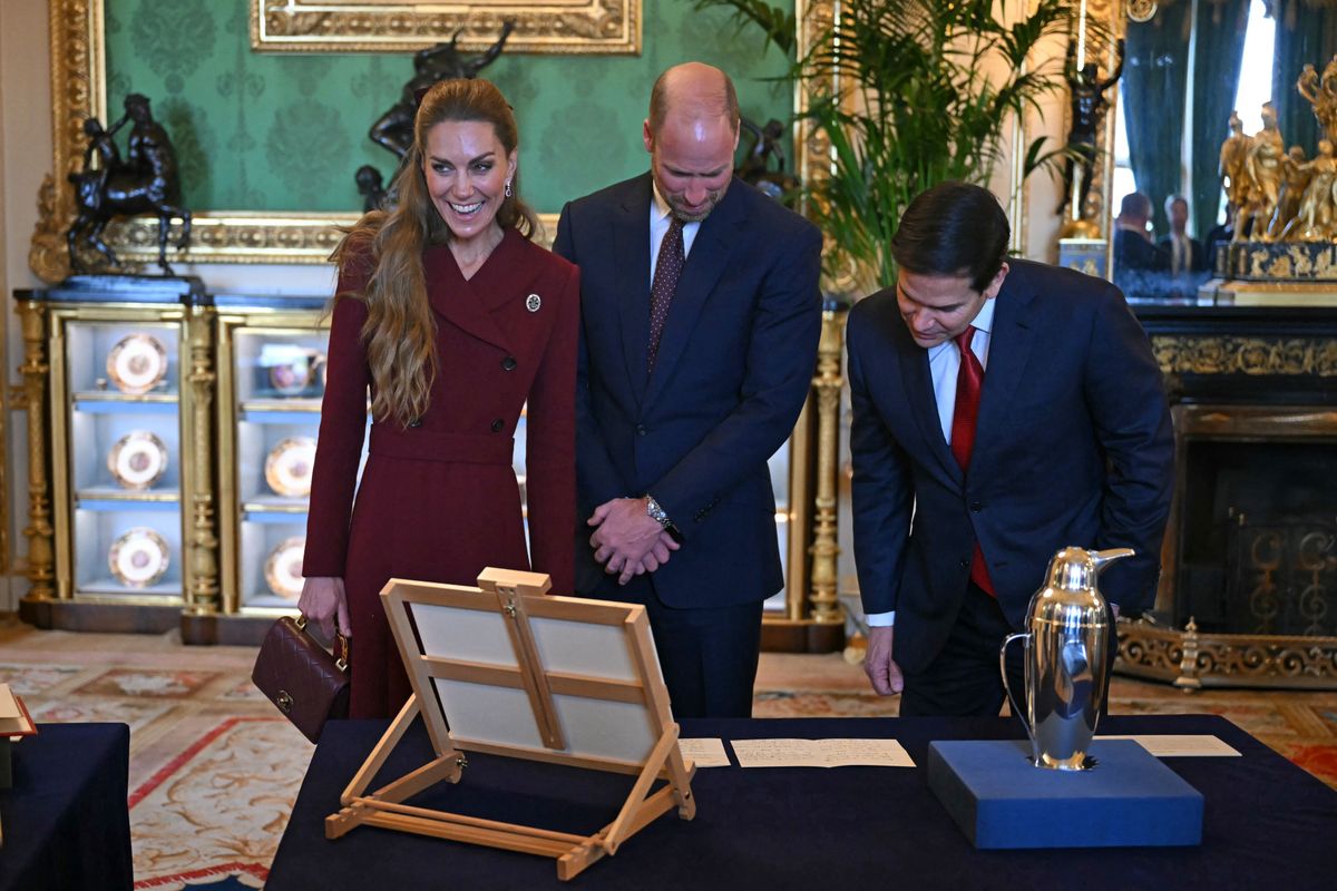 Britain's Catherine, Princess of Wales, Britain's Prince William, Prince of Wales and US Secretary of State Marco Rubio view items from the Royal Collection in the Green Drawing Room at Windsor Castle, in Windsor, on September 17, 2025, during the US President's second State Visit. US President Donald Trump arrived in Britain for an unprecedented second State Visit, with the UK government rolling out a royal red carpet welcome to win over the mercurial leader. (Photo by ANDREW CABALLERO-REYNOLDS / AFP) (Photo by ANDREW CABALLERO-REYNOLDS/AFP via Getty Images)          