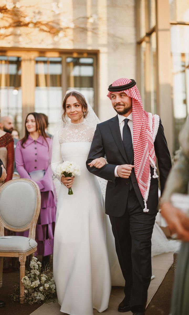 The bride stunned for her big day wearing a Dior gown.