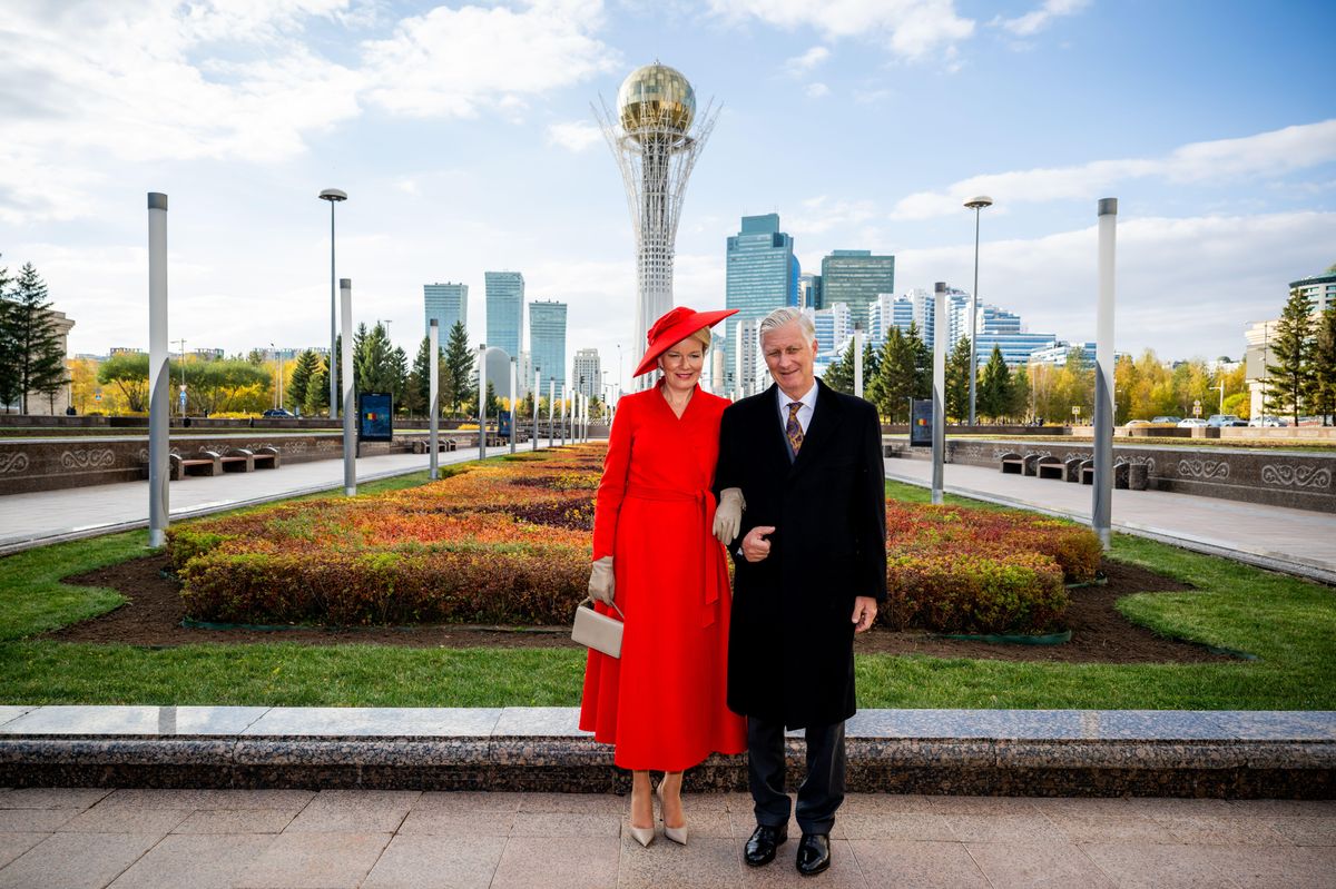 Queen Mathilde and King Philippe pose arm in arm against Astana’s skyline during their state visit to Kazakhstan.