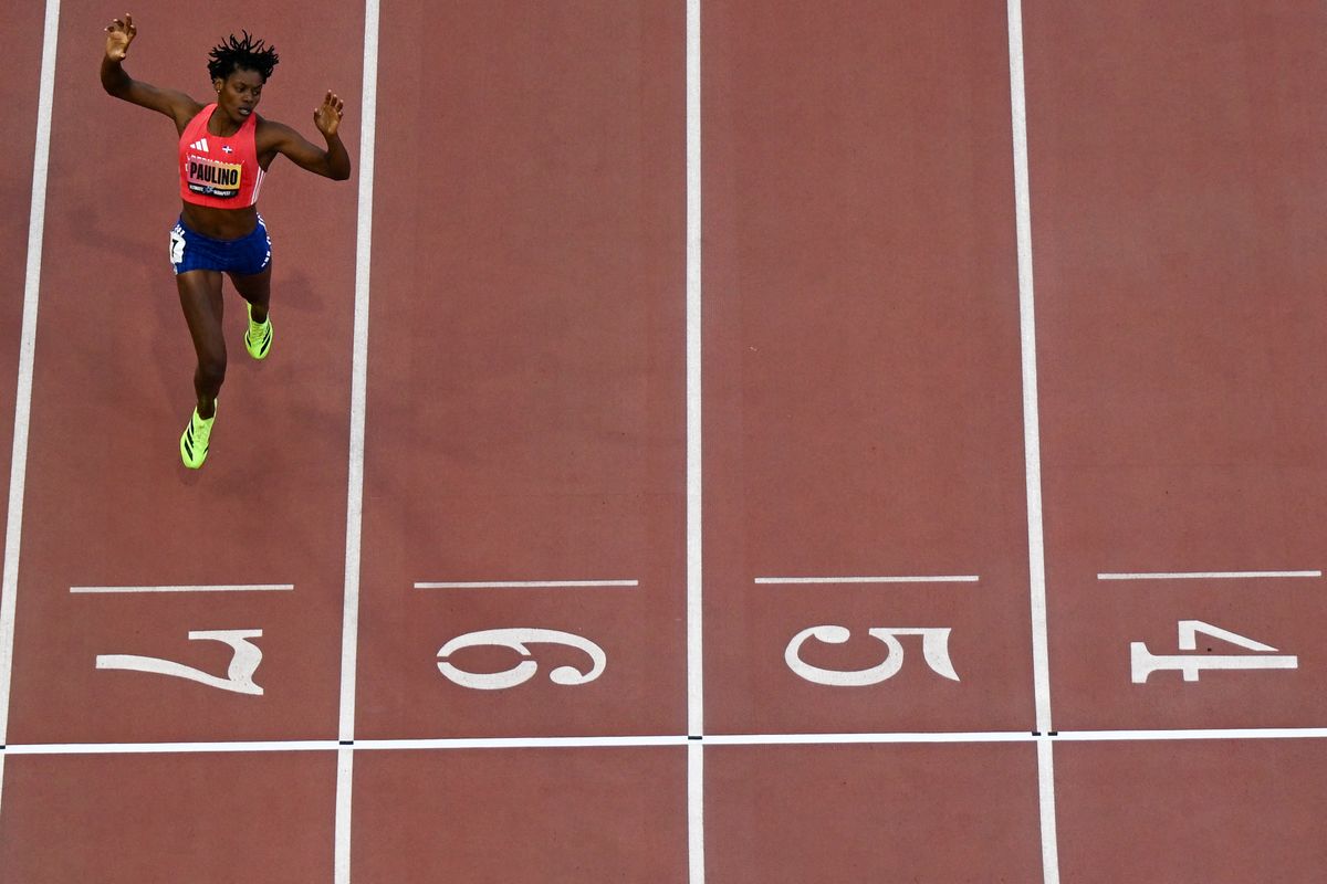 Dominican Republic's Marileidy Paulino approaches the finish line to win the women's 400m final during the World Athletics Ultimate Championship