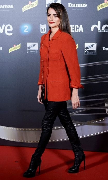 Penelope Cruz red coat and black leather pants