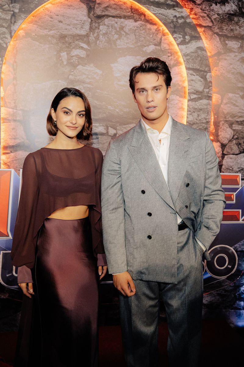 Nicholas Galitzine contrasted Mendes’ monochromatic look in an oversized gray Prada suit during the São Paulo premiere.