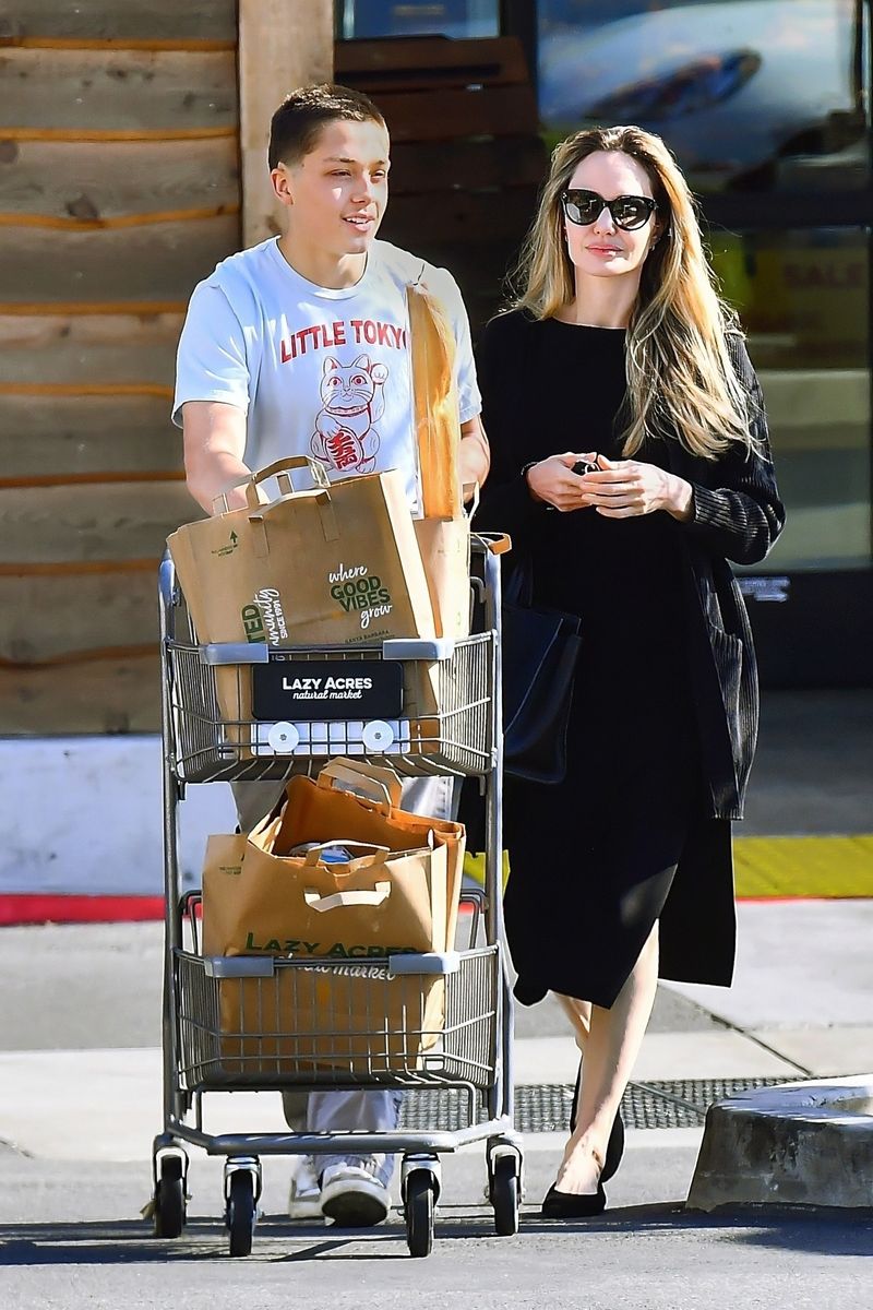 Knox and Angelina Jolie leaving Lazy Acres supermarket in LA