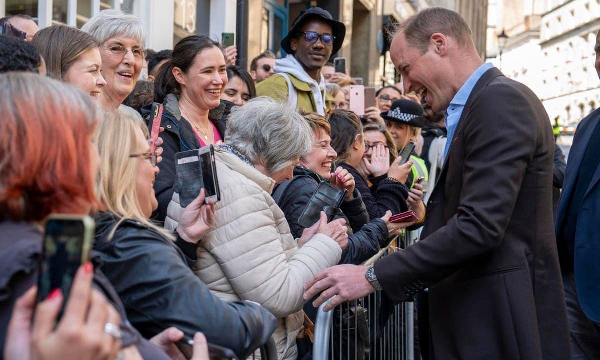 The Prince of Wales laughed with a well-wisher in Birmingham. The palace noted that the royal couple visited Birmingham "to celebrate the city's diverse culture and heritage and meet future leaders in the creative industries."