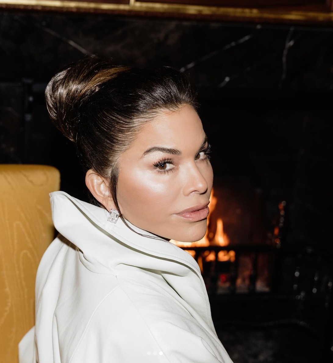 Between the glossy updo, the soft-glow complexion, and the dramatic, tailored silhouette, it’s no wonder Kardashian slid in with her digital coronation.