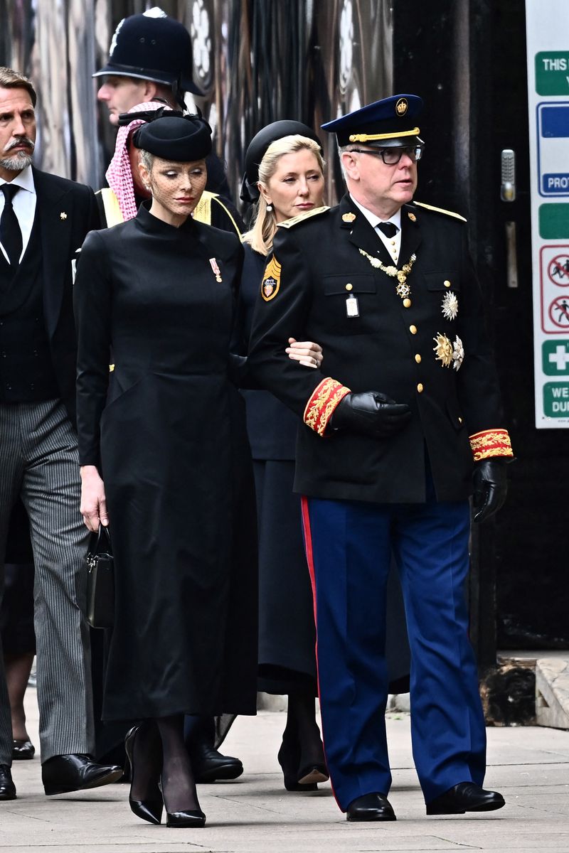 Princess Charlene wore deep mourning attire to attend Queen Elizabeth II's funeral.