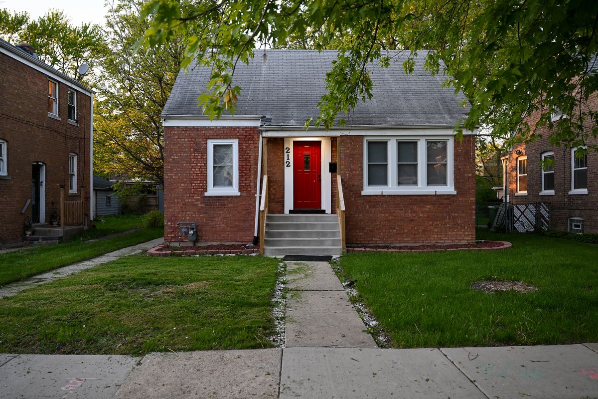 The childhood home of Cardinal Robert Prevost is seen with a red door on May 8, 2025, in Dolton, Illinois. 