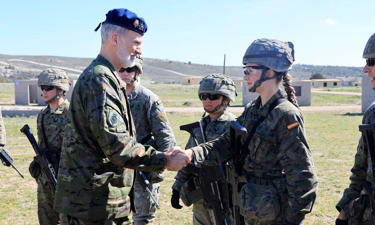 King Felipe was photographed shaking hands with his firstborn.