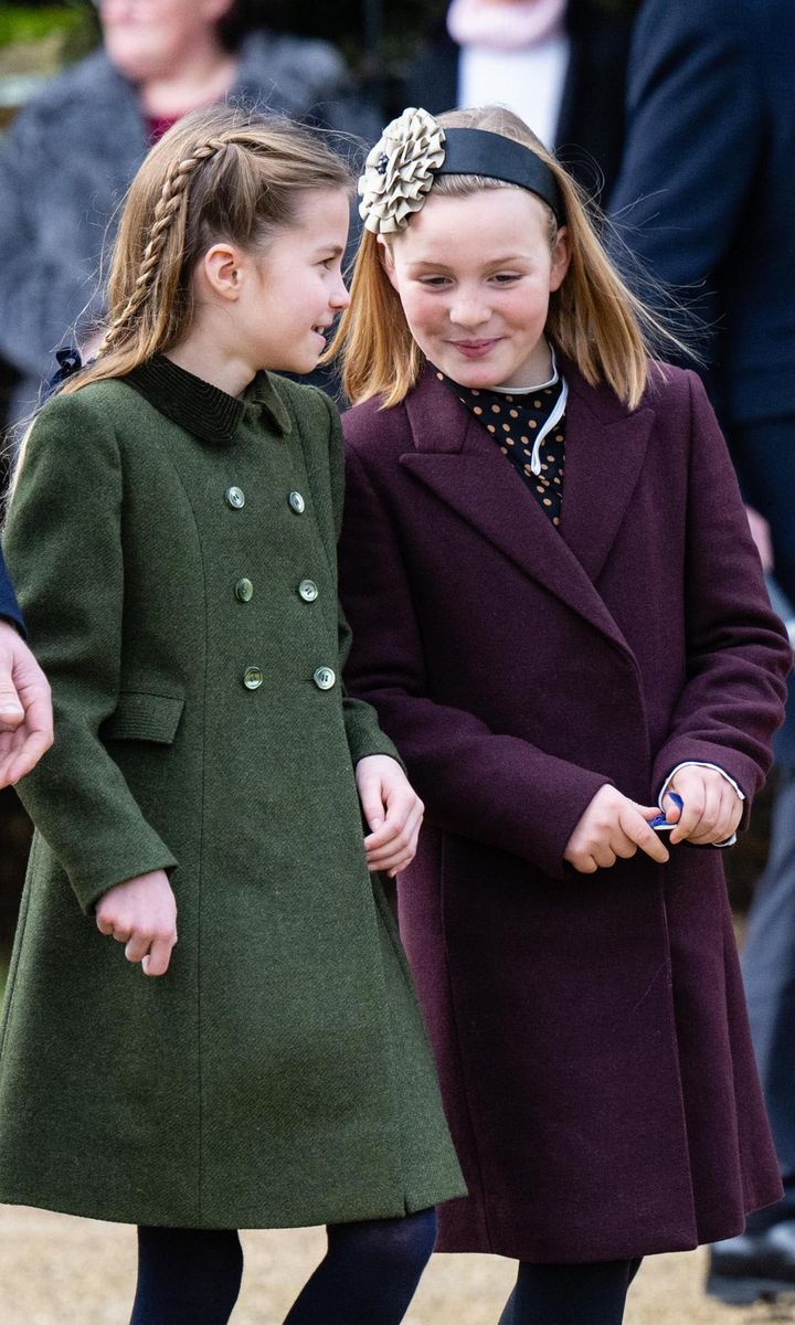 Charlotte and Mia chatted while walking together.