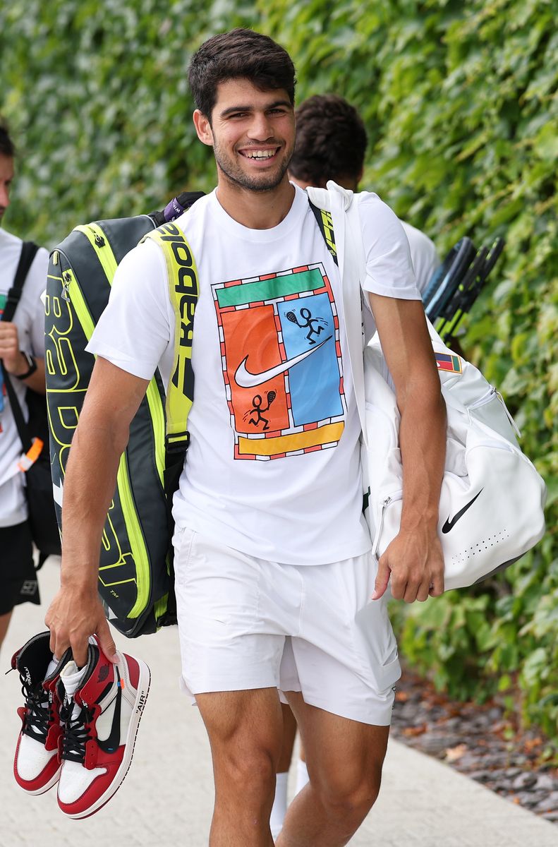 Carlos Alcaraz walks out for his first practice session on Wimbledon's grass courts prior to The Championships Wimbledon 2025 at All England Lawn Tennis and Croquet Club 