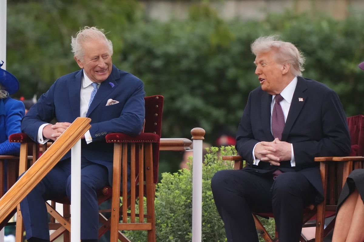 WINDSOR, ENGLAND - SEPTEMBER 17: US President Donald Trump (R) joins King Charles III to observe a Beating Retreat ceremony at Windsor Castle on September 17, 2025 in Windsor, England. President Trump is in England from Sept. 16-18 on his second UK state visit, with the previous one taking place in 2019 during his first presidential term. (Photo by Jonathan Brady - WPA Pool/Getty Images)