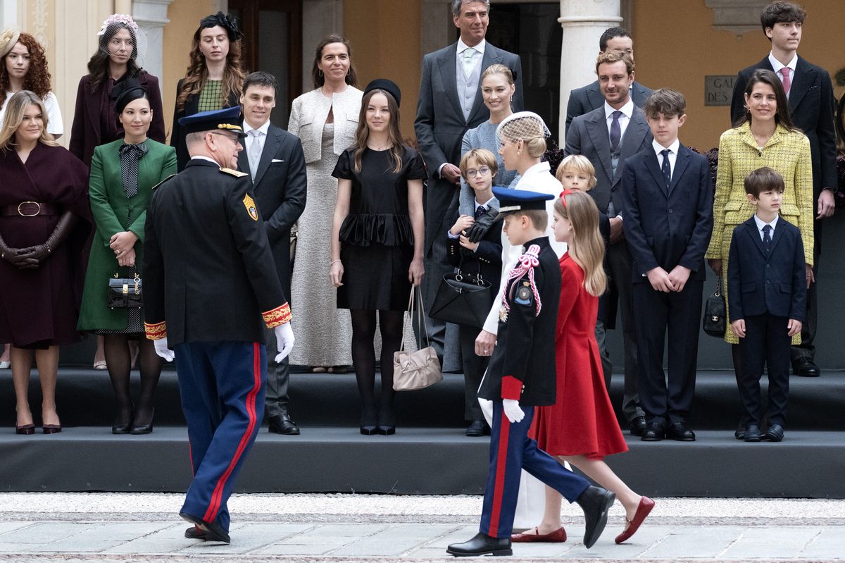 Prince Albert II of Monaco, Princess Charlene of Monaco, Princess Gabriella of Monaco, and Prince Jacques of Monaco walk in the military parade during the Monaco National Day 2025