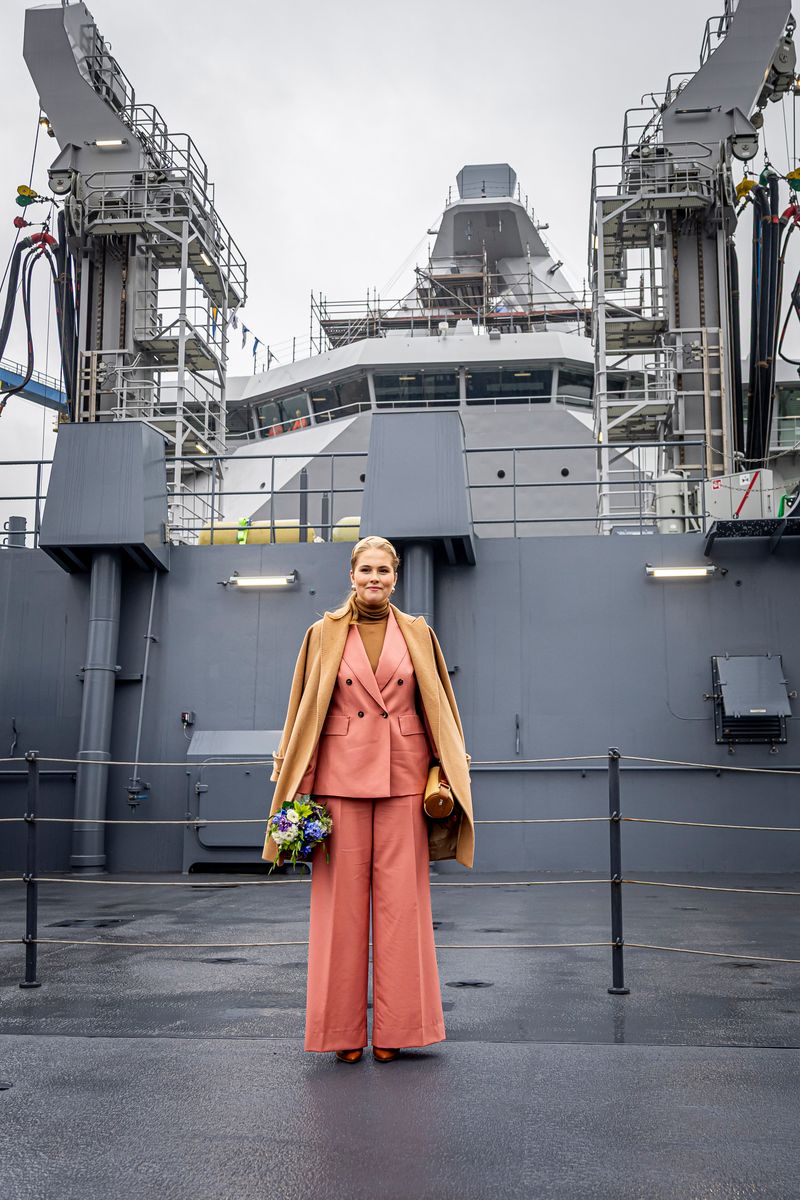 VLISSINGEN, NETHERLANDS - FEBRUARY 21: Princess Amalia of the Netherlands poses on the deck as she names the naval ship Den Helder built by Damen Naval Shipyards on February 21, 2025 in Vlissingen, Netherlands. The naming ceremony is the first public solo event for Princess Amalia in The Netherlands. (Photo by Patrick van Katwijk/Getty Images)