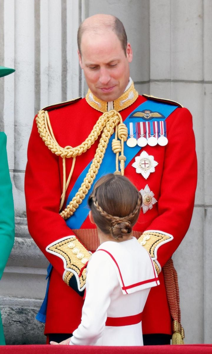 The eight-year-old Princess' hair was styled up in a bun with two braids for the occasion.