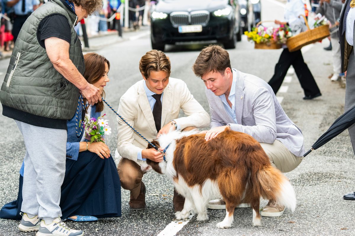 Crown Prince Christian of Denmark, Prince Vincent of Denmark and Queen Mary of Denmark say hello to their own dogs father on July 6, 2026 in Graasten, Denmark.