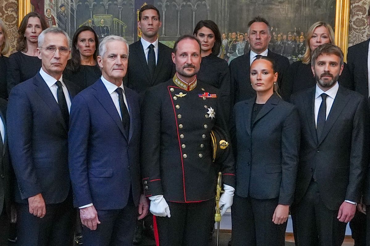 (From L) Norway's Finance Minister Jens Stoltenberg, Norwegian Prime Minister Jonas Gahr Store, Norway's new King Haakon VIII and Norway's Crown Princess Ingrid Alexandra pose for a picture with members of the Norwegian government during an extraordinary cabinet meeting at the Royal Palace, following the death of King Harald V, in Oslo, Norway, on August 28, 2026. 