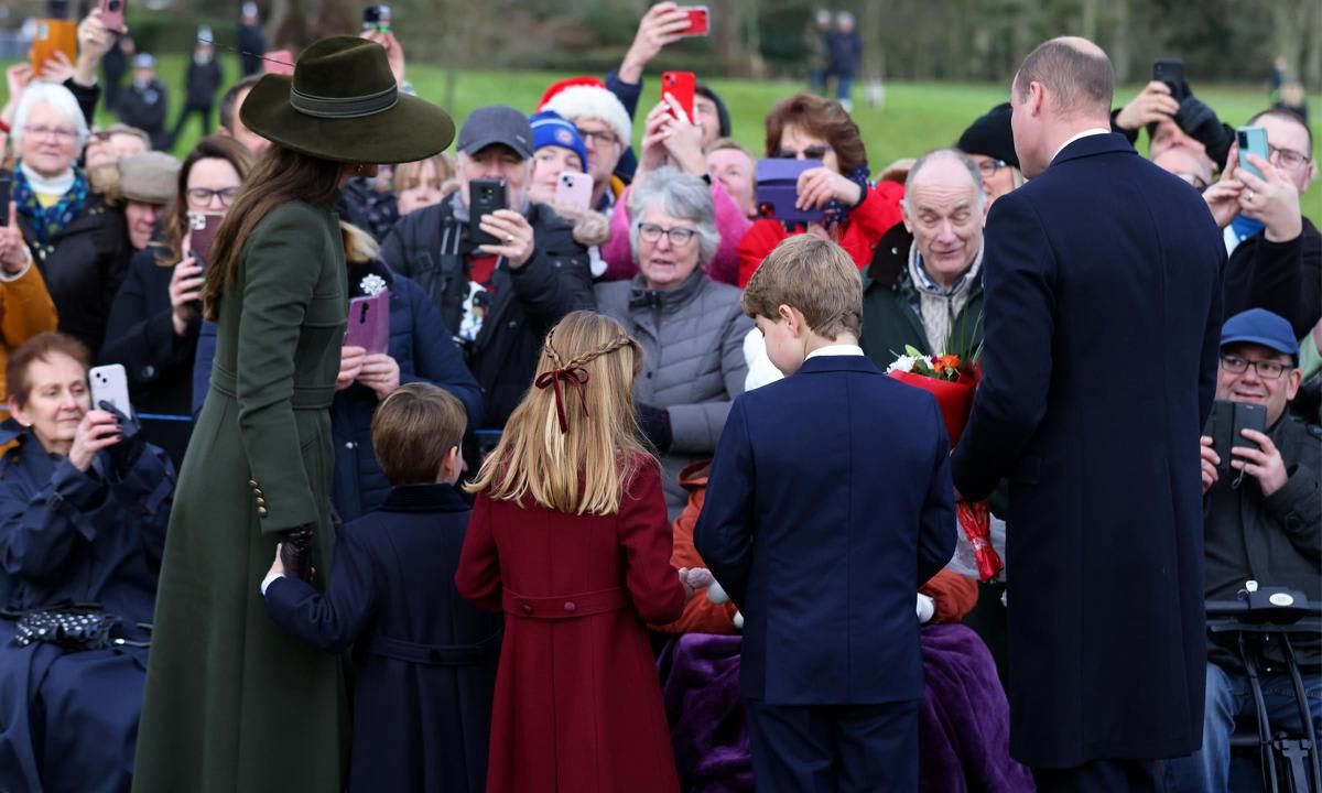 The Waleses spoke with well-wishers after the service