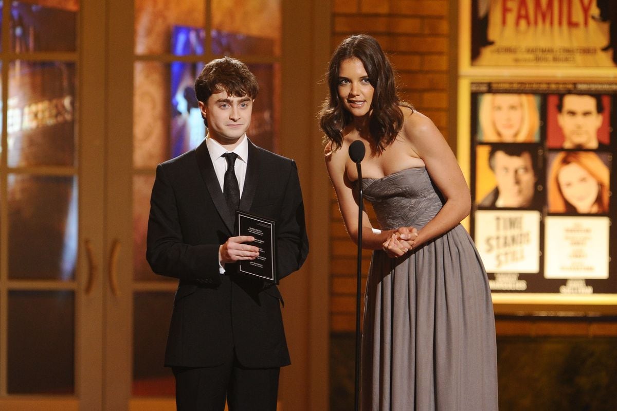 Daniel Radcliffe and Katie Holmes speak onstage during the 64th Annual Tony Awards at Radio City Music Hall on June 13, 2010 