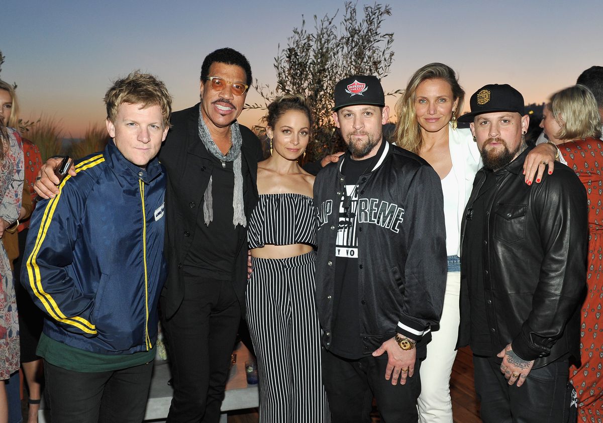 Joel and Benji Madden alongside Nicole Richie, Cameron Diaz, and Lionel Richie