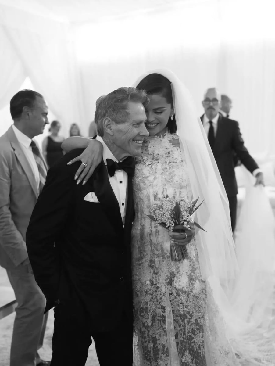 Gomez’s grandfather, David Cornett, proudly walking her down the aisle.
